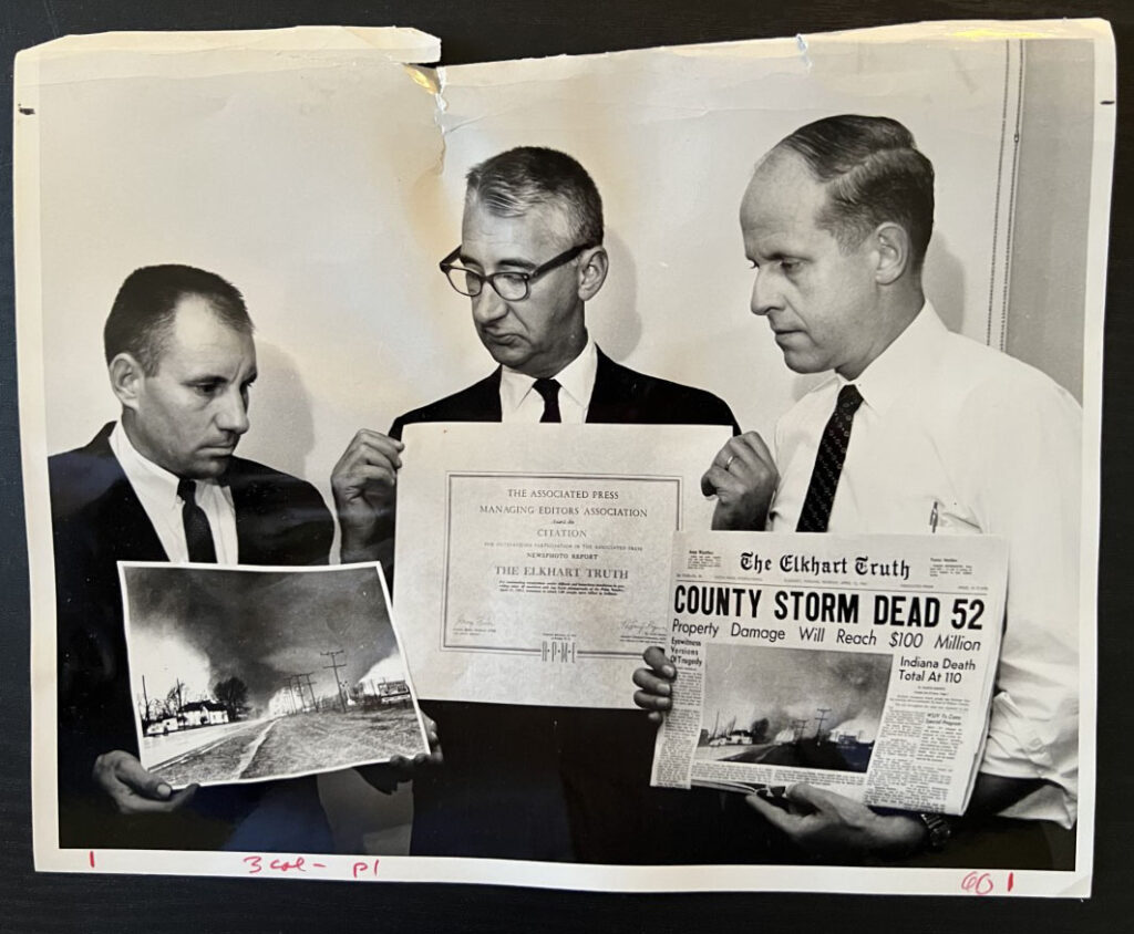 Elkhart Truth photographer Paul Huffman, with city editor Carl Miller and reporter Bill Borneman