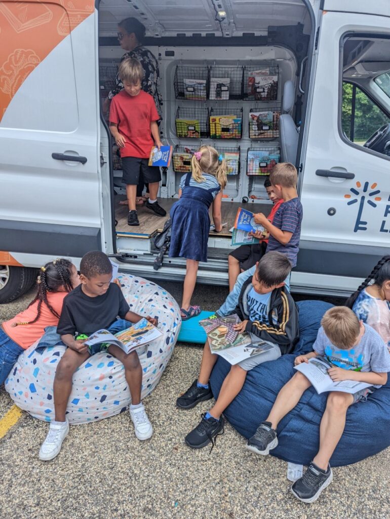 Concord students enjoying Free Books to Feed Minds in the summer of 2022. 