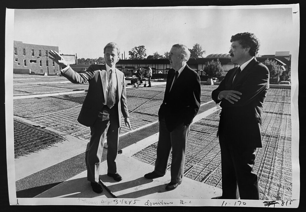Amid the construction before the Civic Plaza cement was poured, architect Tom Borger, urban planner William Whyte, and city planner Dennis Harney have a discussion. (Elkhart Truth photo by Fred Flury)