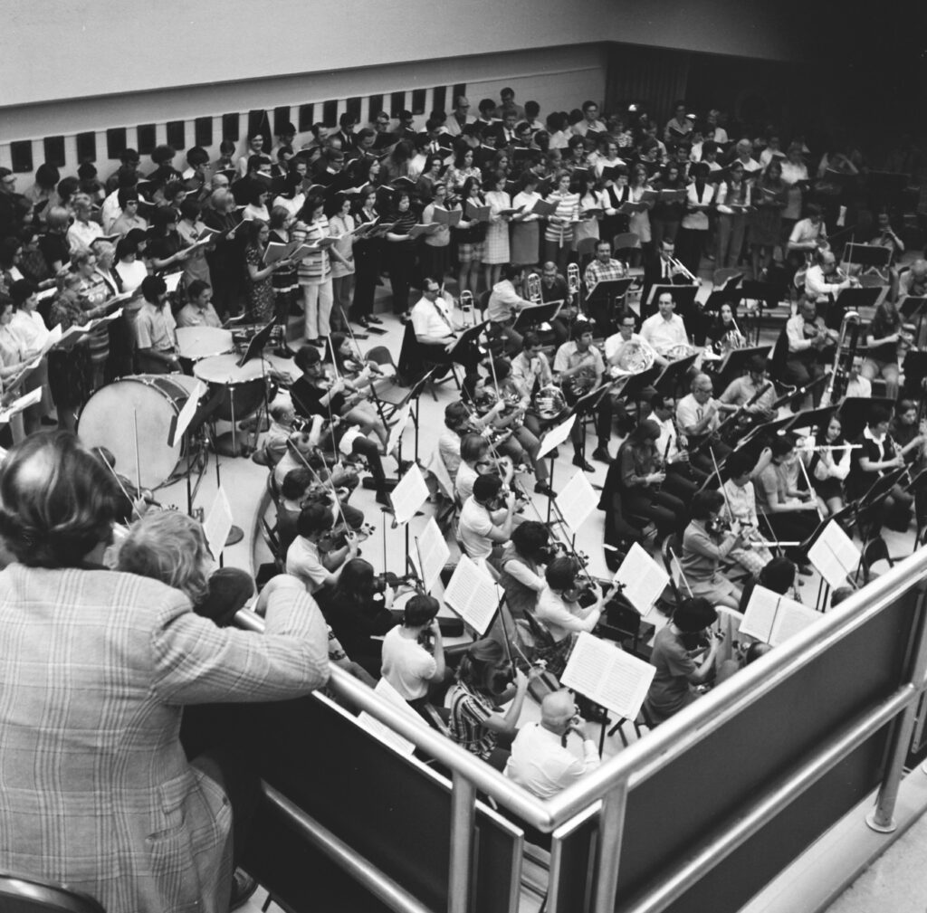 Gaska's orchestra practices Beethoven's Ninth Symphony with a choir before the April 1971 event (Elkhart Truth photo)