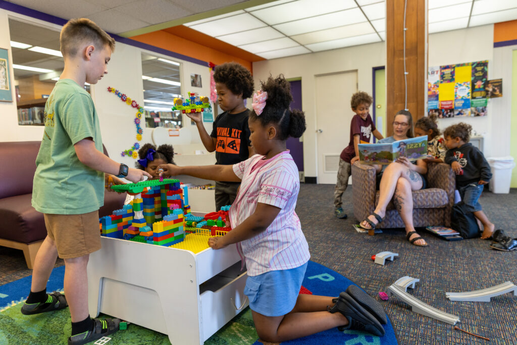 Views of Elkhart Public Library programs and activities, both at the flagship downtown location and the recently renovated branches.