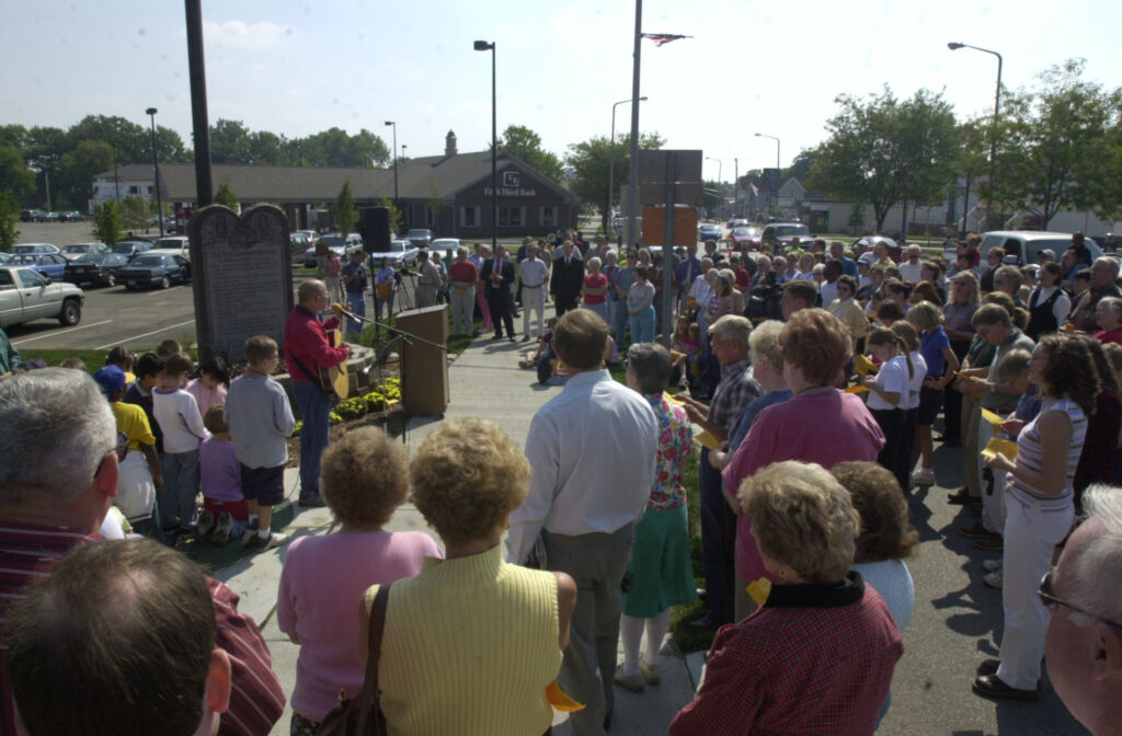 Crowd assembled at the rededication of the Ten Commandments monument on North Main Street in 2002.